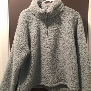 Blue/gray sweater. Never worn . Too big